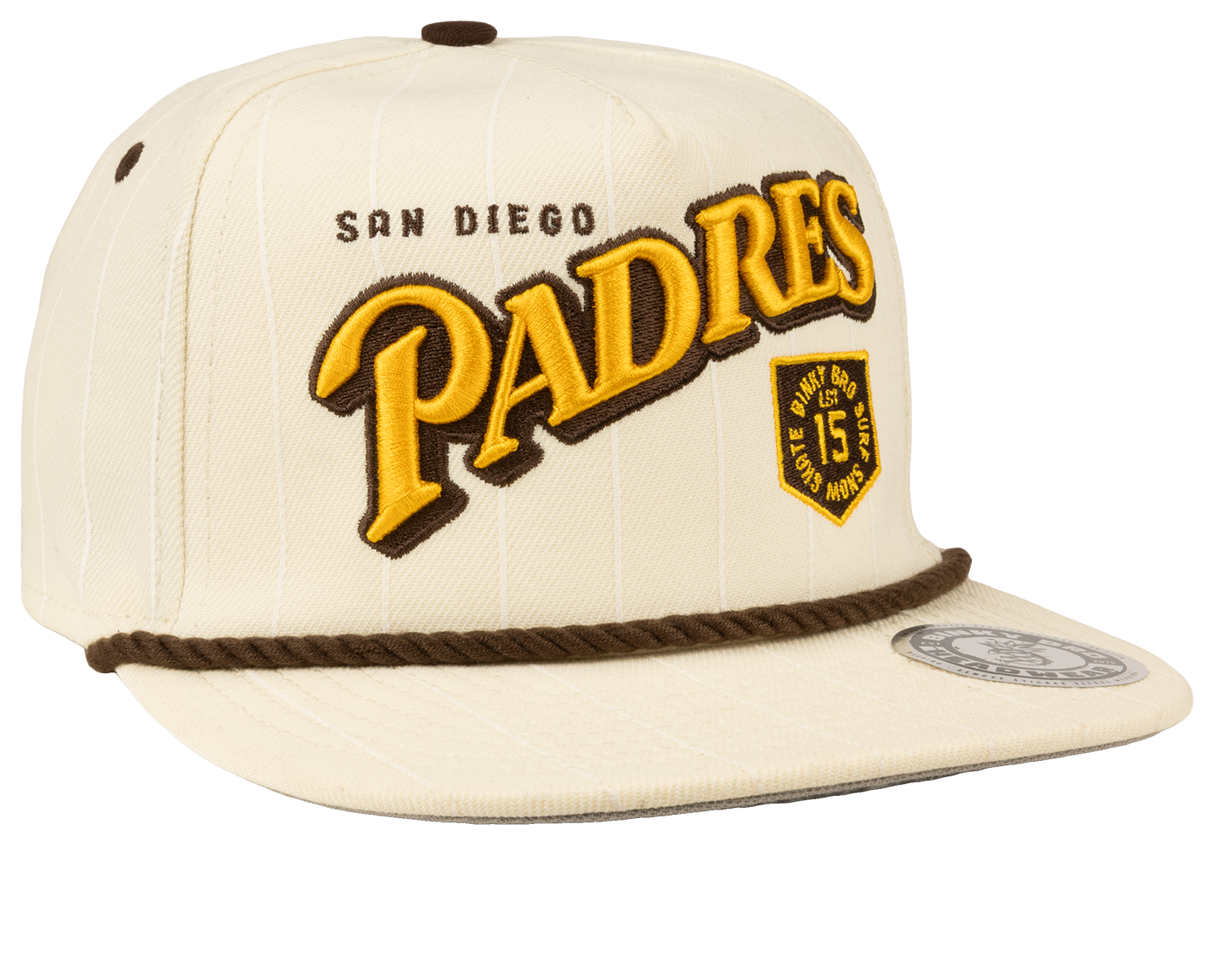 Cream-colored snapback cap featuring "San Diego Padres" in bold yellow and brown lettering, with a decorative rope detail.
